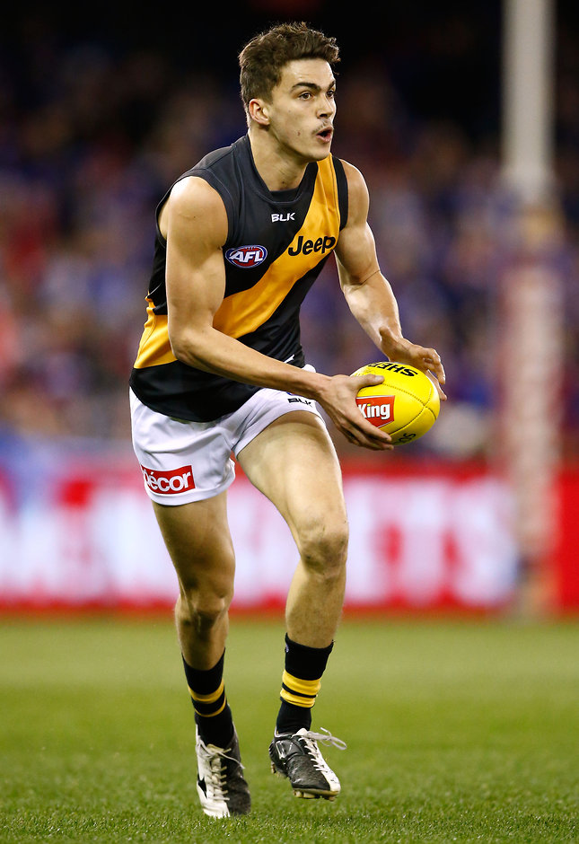 AFL 2016 Rd 16 - Western Bulldogs v Richmond MELBOURNE, AUSTRALIA - JULY 09: Debutante, Oleg Markov of the Tigers in action during the 2016 AFL Round 16 match between the Western Bulldogs and the Richmond Tigers at Etihad Stadium on July 9, 2016 in Melbourne, Australia. (Photo by Adam Trafford/AFL Media)